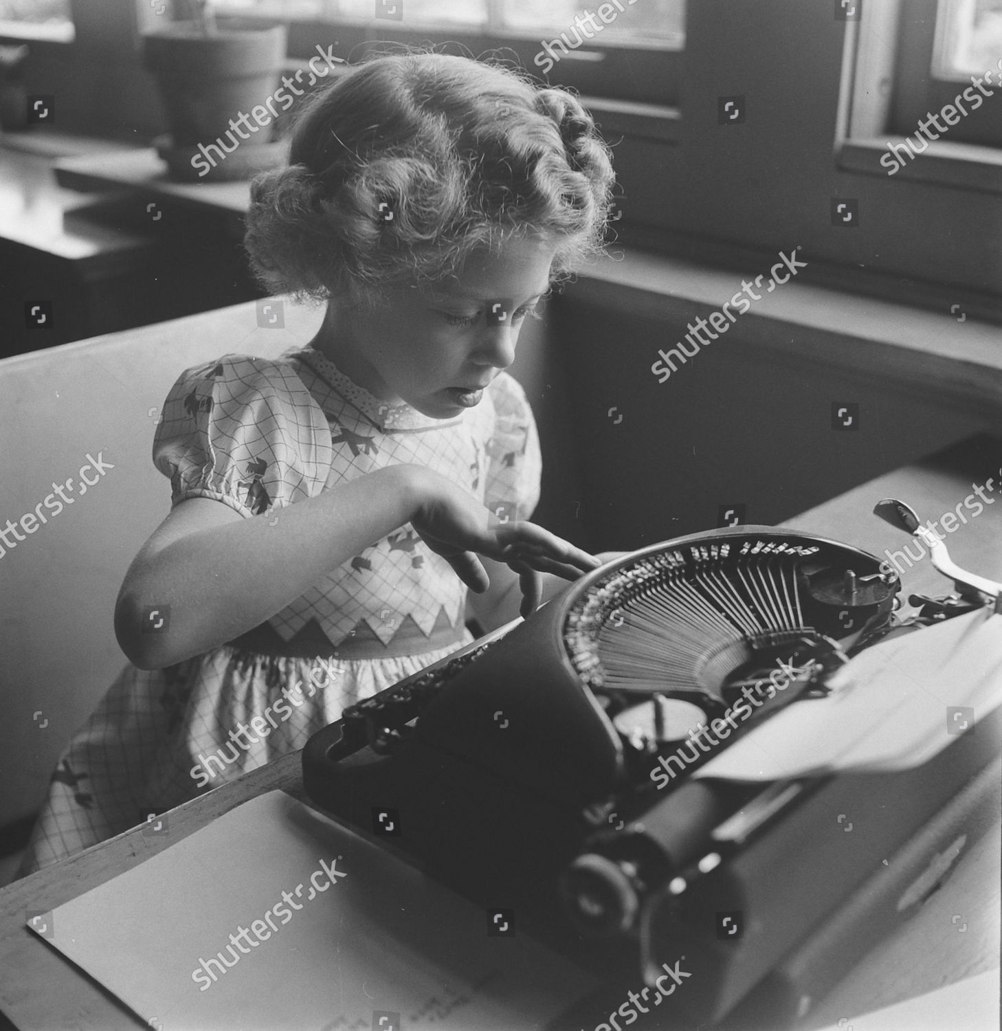 student-using-typewriter-matthew-fontaine-maury-editorial-stock-photo