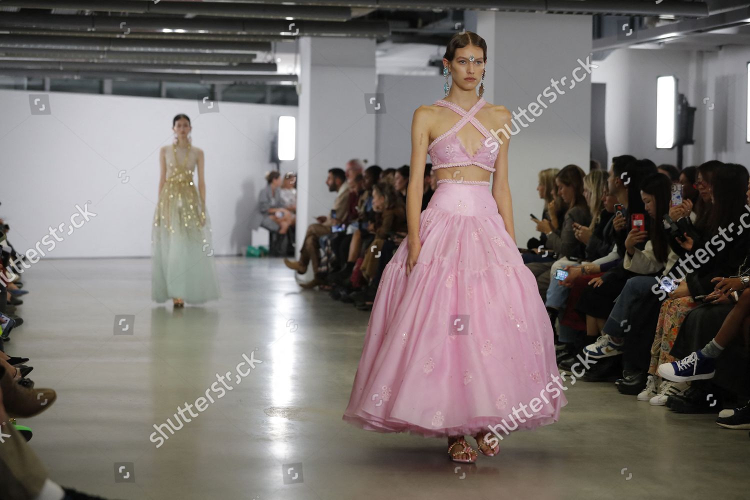 A model walks the runway during the Giambattista Valli Spring Summer