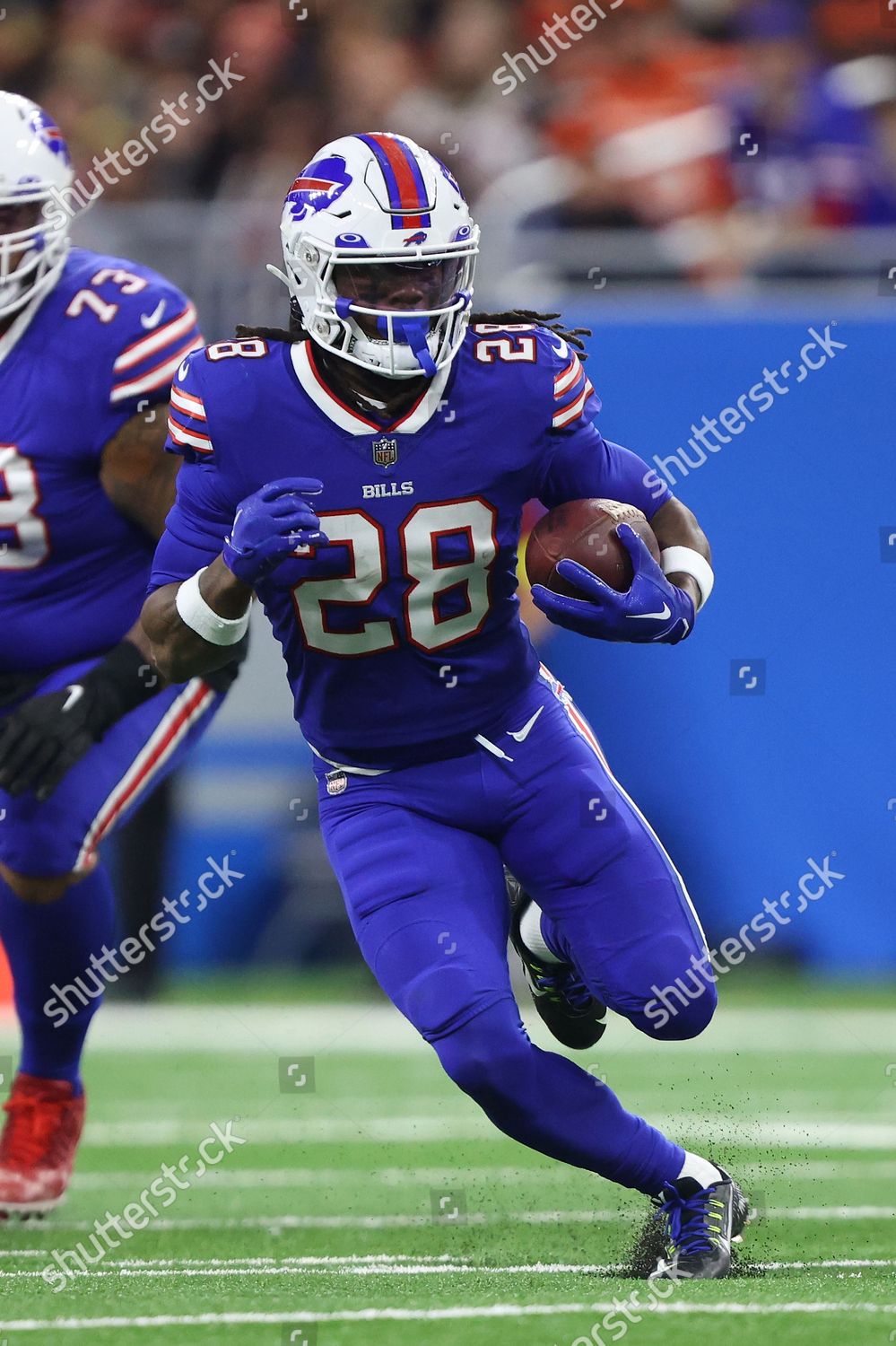 Buffalo Bills running back James Cook (28) runs the ball against