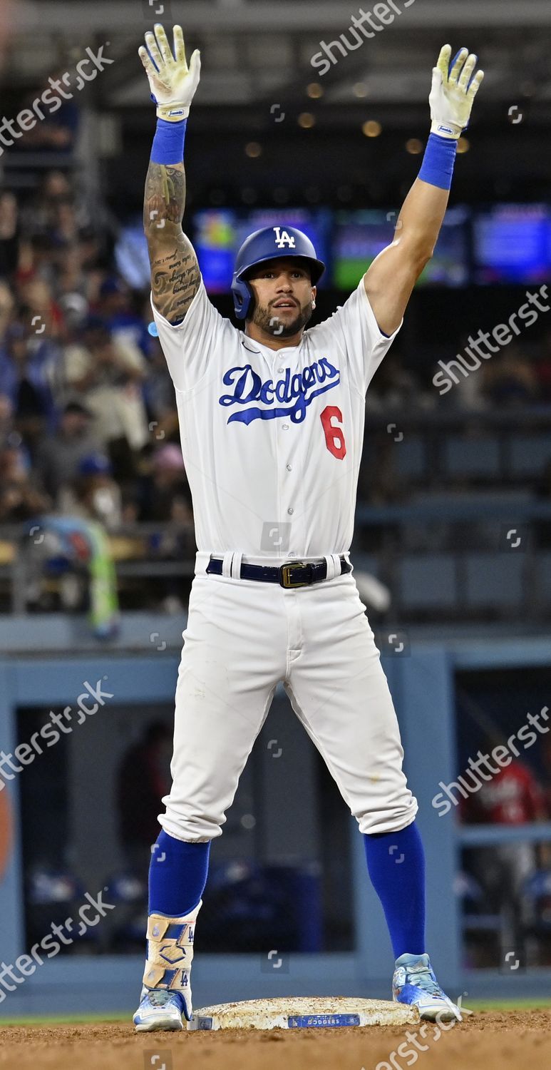 Los Angeles Dodgers' David Peralta (6) celebrates after doubling