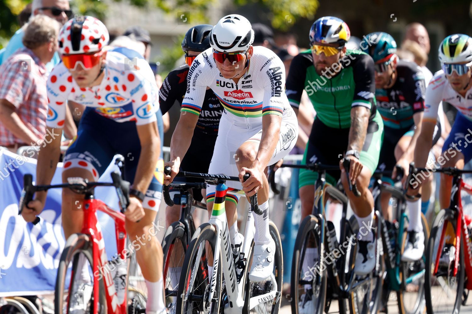 ETTEN-LEUR - World champion Mathieu van der Poel during the Pro Cycling  Tour Etten-Leur. Van der Poel shows for the first time his rainbow jersey  that he won during the World Cycling