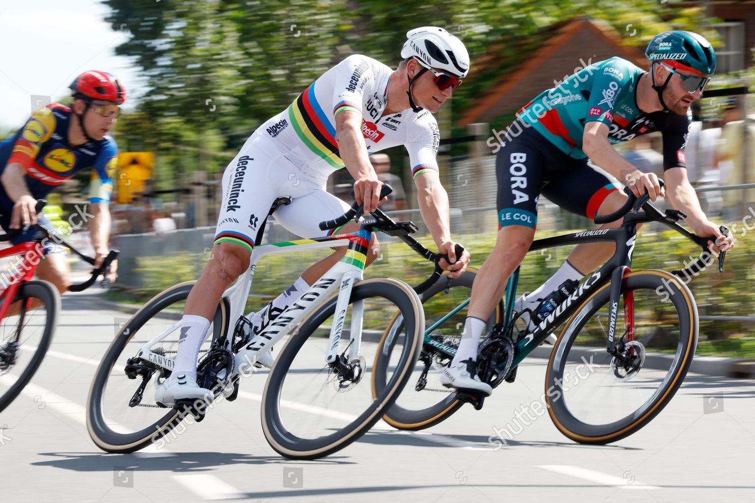 ETTEN-LEUR - World champion Mathieu van der Poel during the Pro Cycling  Tour Etten-Leur. Van der Poel shows for the first time his rainbow jersey  that he won during the World Cycling