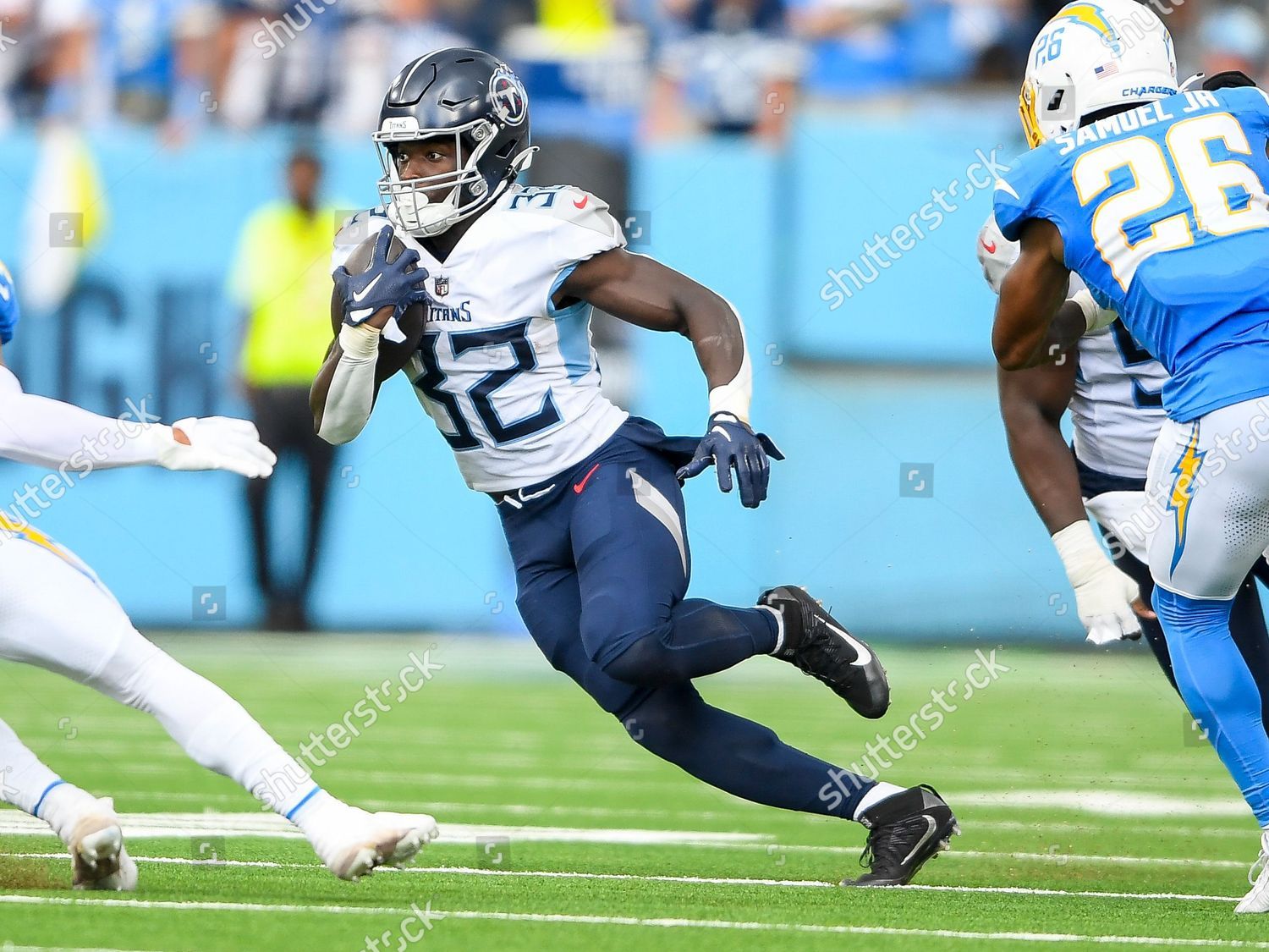 Tennessee Titans running back Tyjae Spears (32) is tackled by