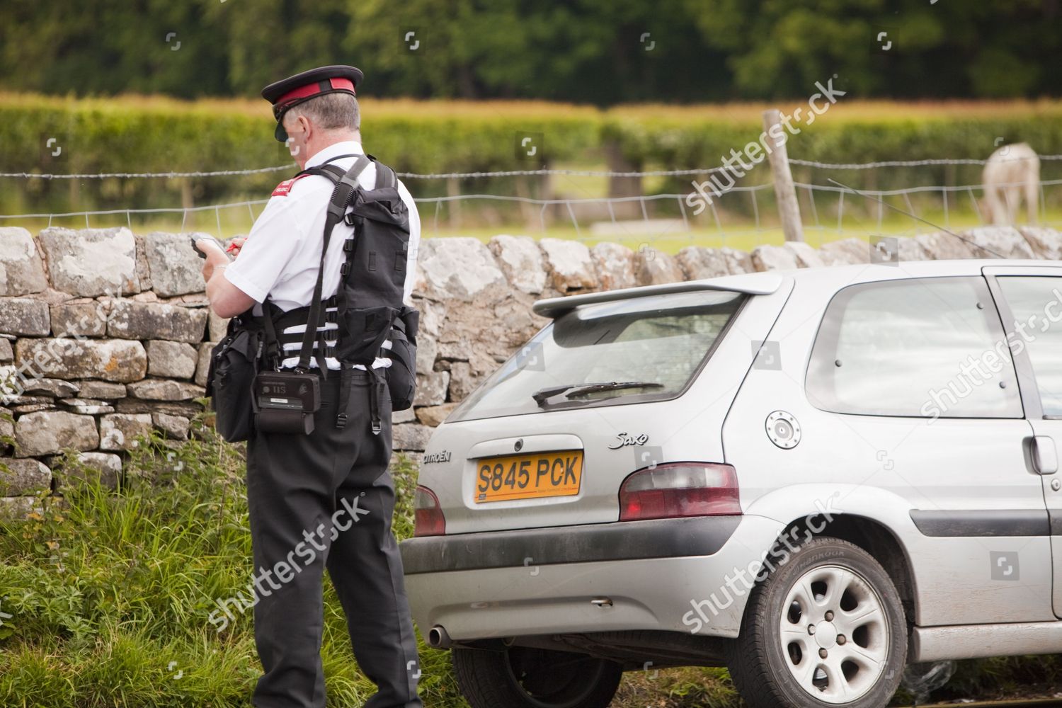 Parking Attendant Issues Ticket Car Parked Editorial Stock Photo
