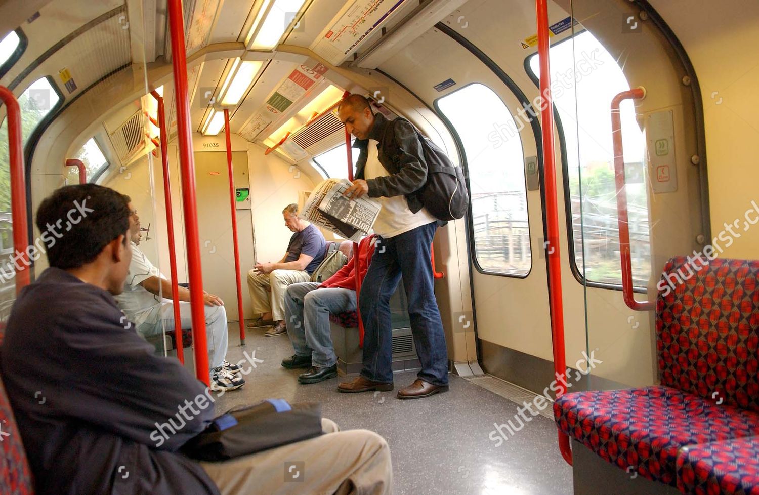 Shekhar Bhatia Travelling On The Tube With A Rucksack Following The London Bombings Asian Journalist Shekhar Bhatia Travelling On The Tube With A Rucksack Following The London Bombings Asian Journalist