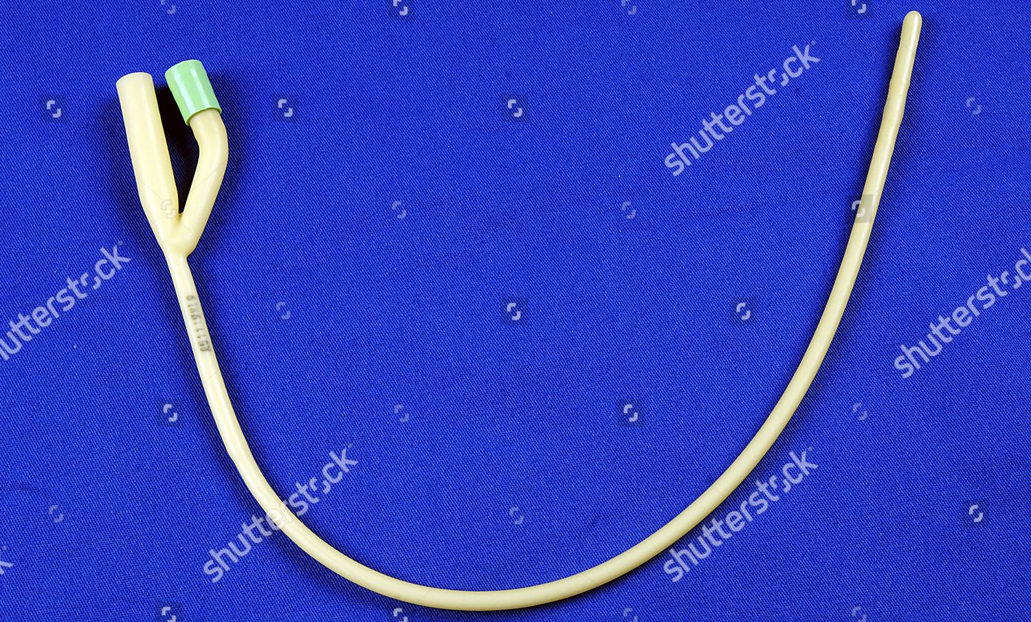 Paediatric Foley Catheter On Blue Table Editorial Stock Photo - Stock ...