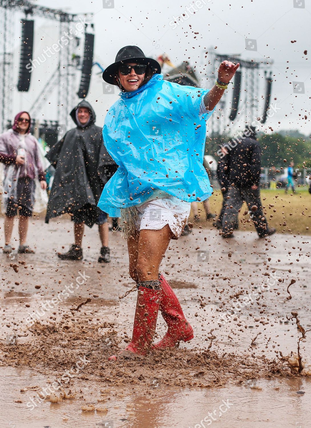 Festivalgoer Red Hunter Wellies Jumping Puddles Editorial Stock Photo -  Stock Image | Shutterstock