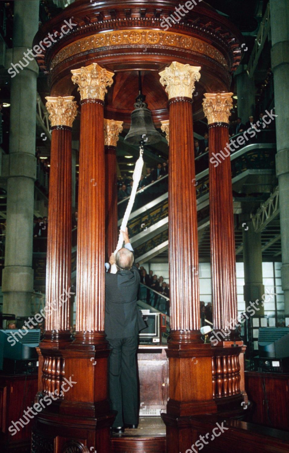 DAVID ROWLAND CHAIRMAN LLOYDS RINGING LUTINE BELL Editorial Stock Photo