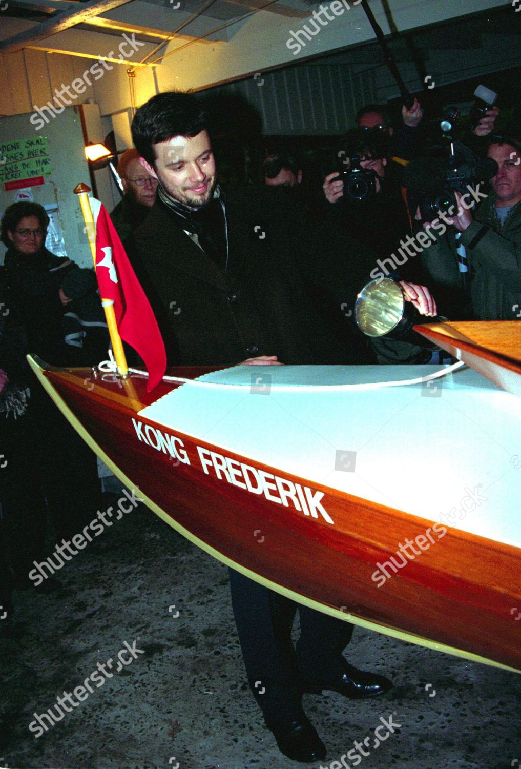 prince-frederik-of-denmark-christens-a-boat-in-copenhagen-denmark-1999-shutterstock-editorial-302976c.jpg