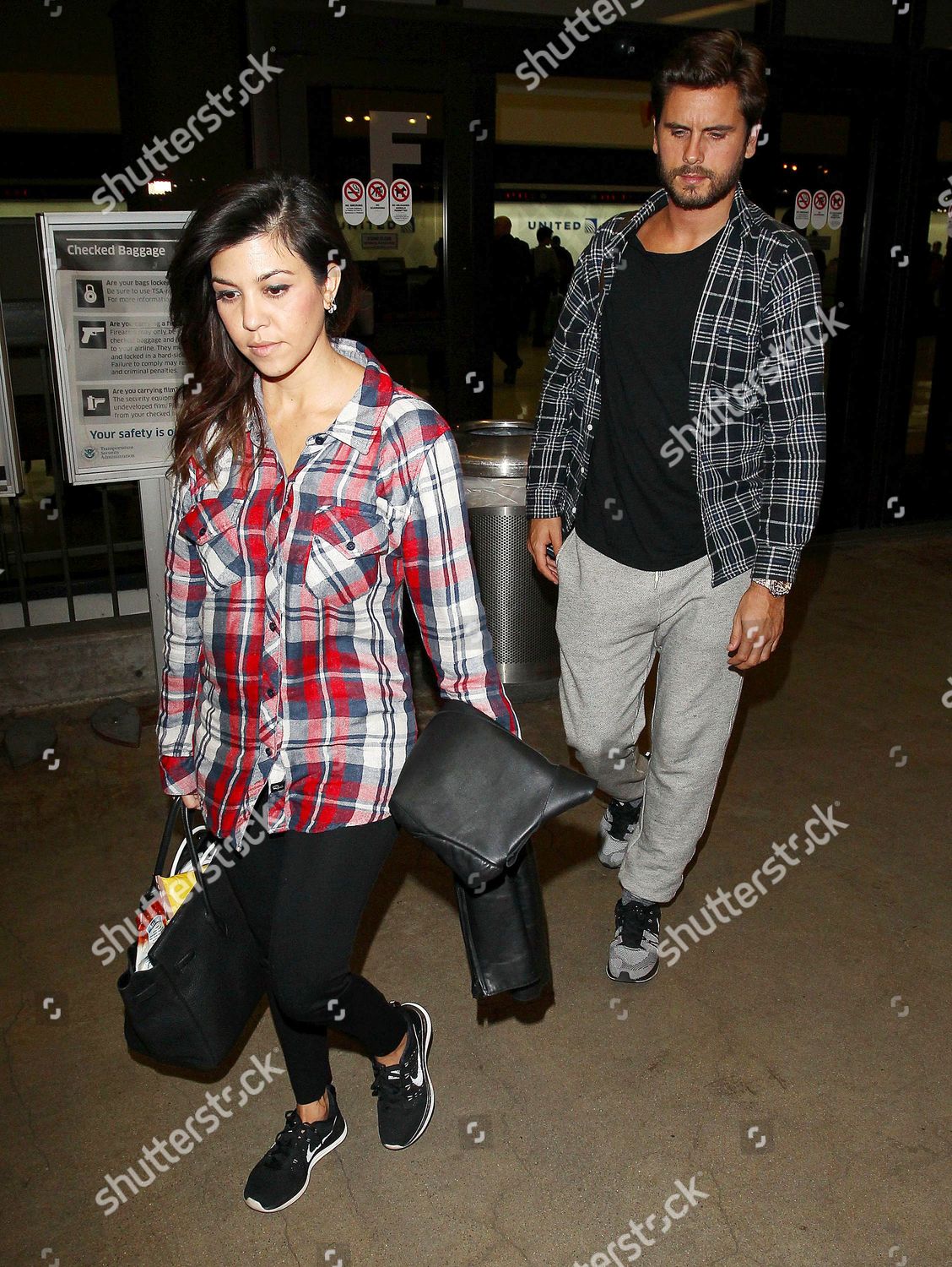 scott disick carrying kourtney