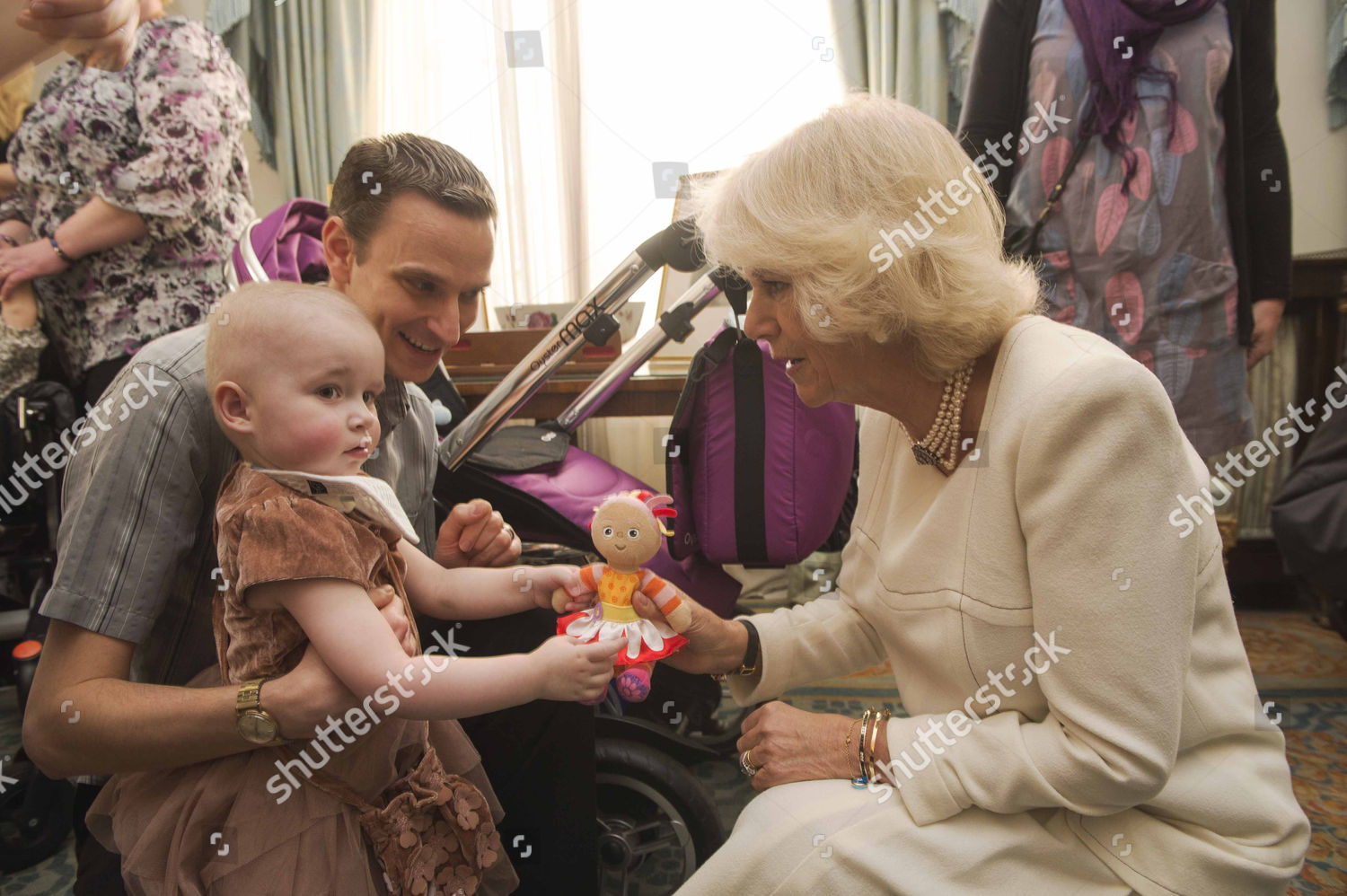 the-duchess-of-cornwall-hosts-a-party-for-children-from-helen-douglas-house-clarence-house-london-britain-shutterstock-editorial-3424962w.jpg