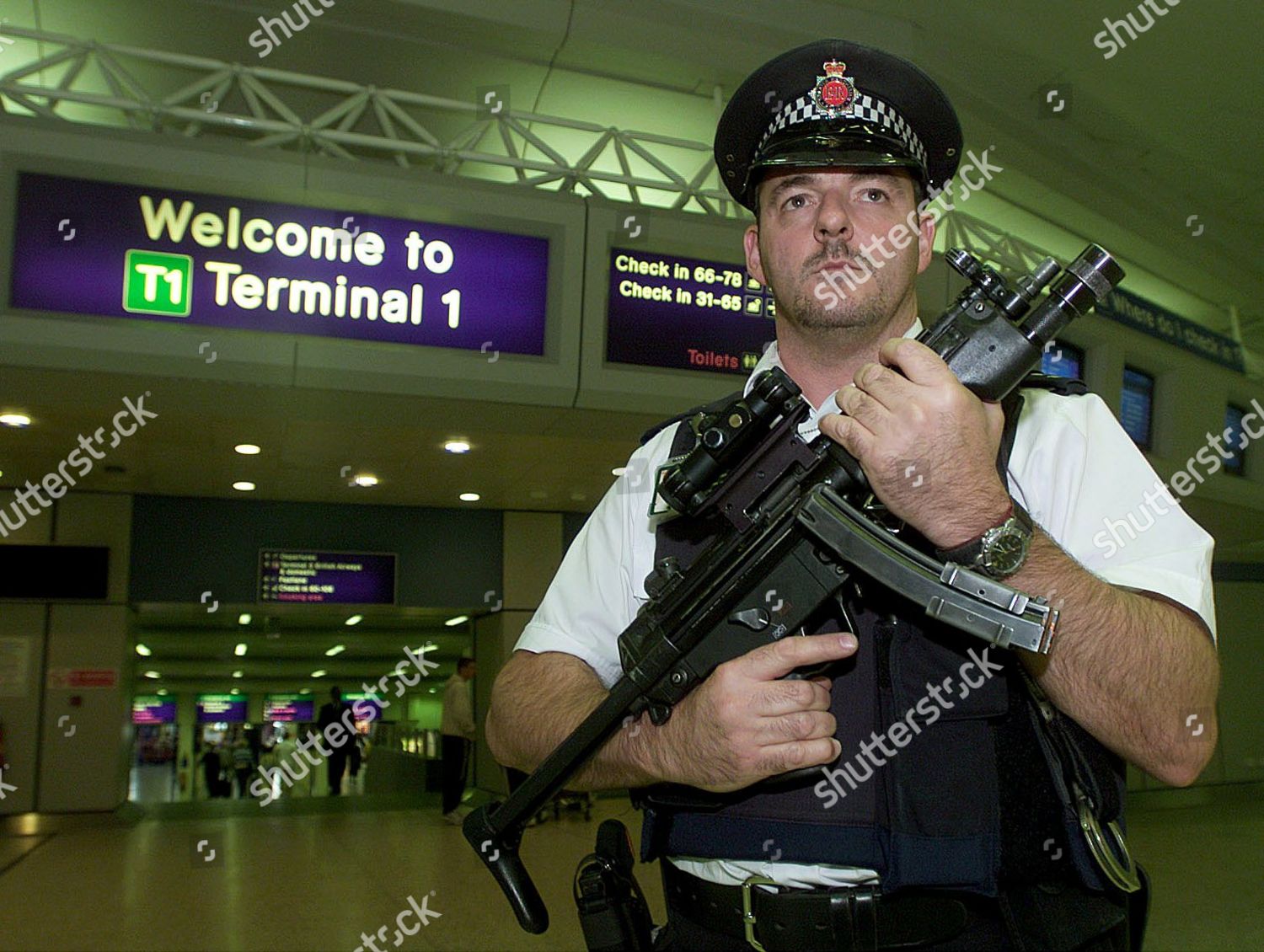 Armed British Police Patrolling Manchester Airport Editorial Stock