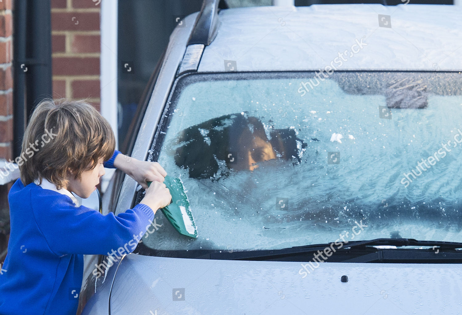 Boy Scrapes Ice Windscreen His Parents Editorial Stock Photo Stock