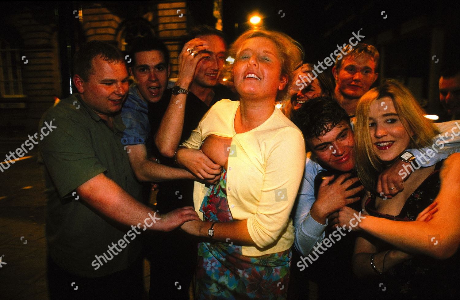 Drunk Men Pawing Women On Streets Editorial Stock Photo Stock Image drunk-men-pawing-women-on-streets-editorial-stock-photo-stock-image