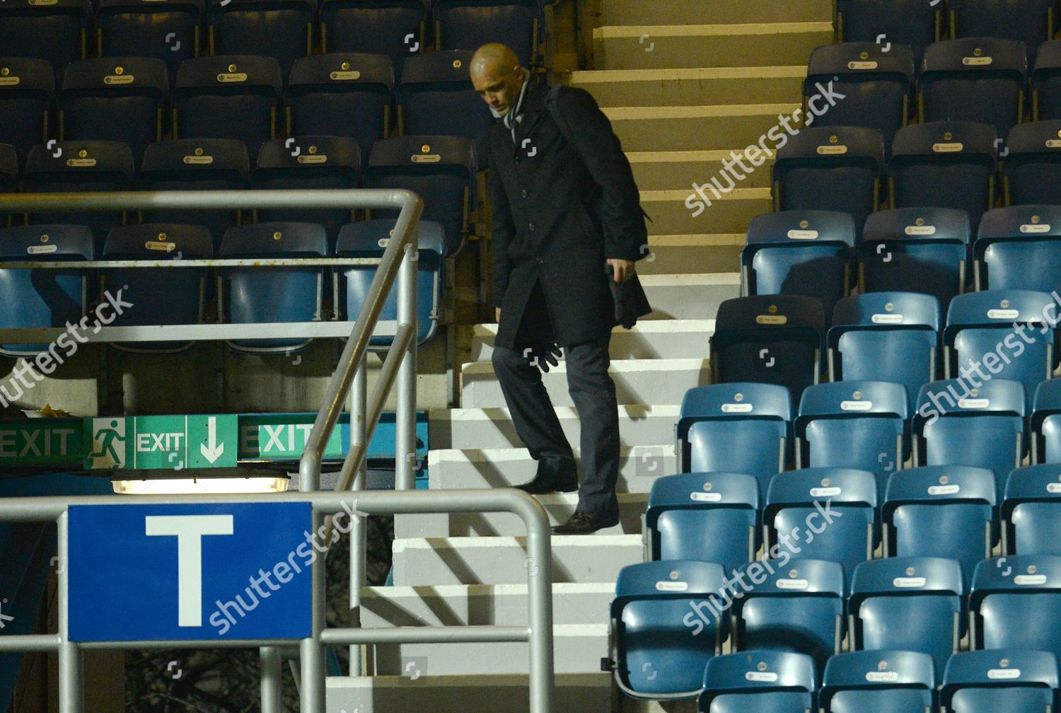 Clarke Carlisle Walks Gingerly Down Stairs End Editorial