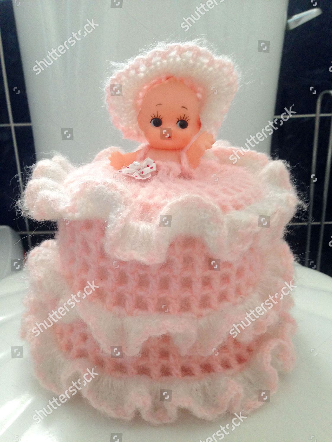 knitted doll toilet roll holder