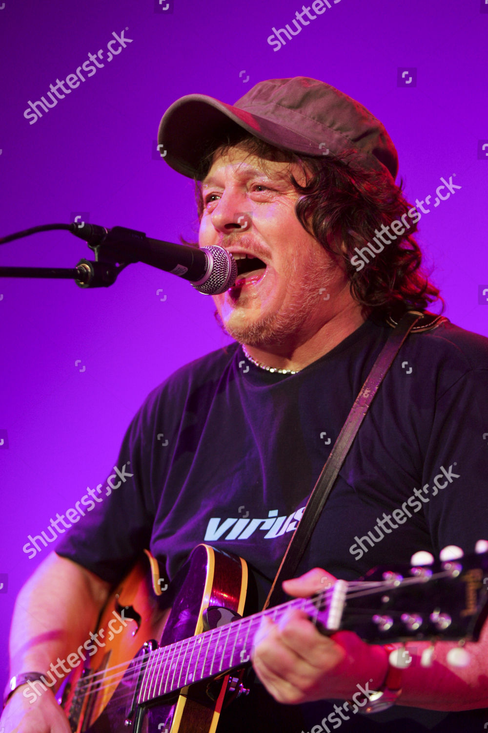 italian-rock-musician-zucchero-live-blue-editorial-stock-photo-stock