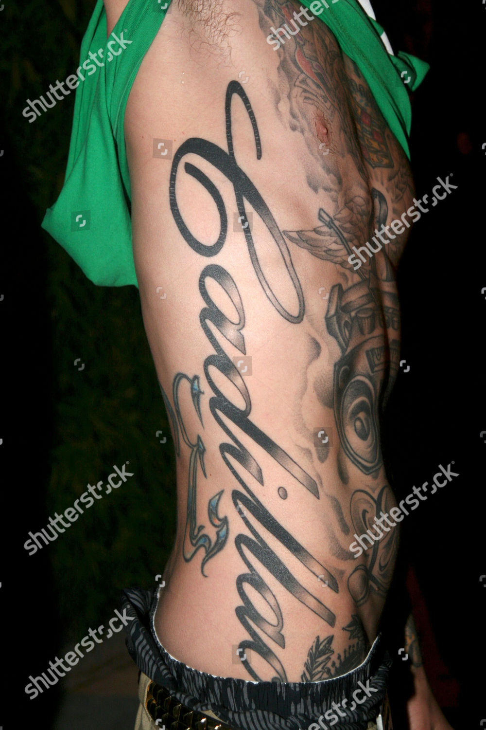 Tattoo uploaded by Ross Howerton  Travis Barkers kickass Cadillac tattoo  Caddy Cadillac lettering TravisBarker  Tattoodo