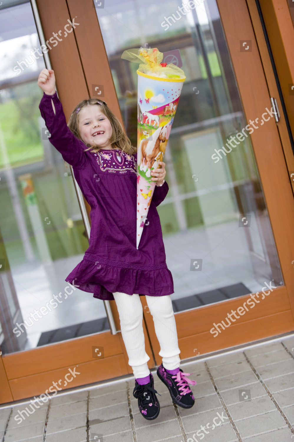 model-released-child-starting-school-holding-editorial-stock-photo