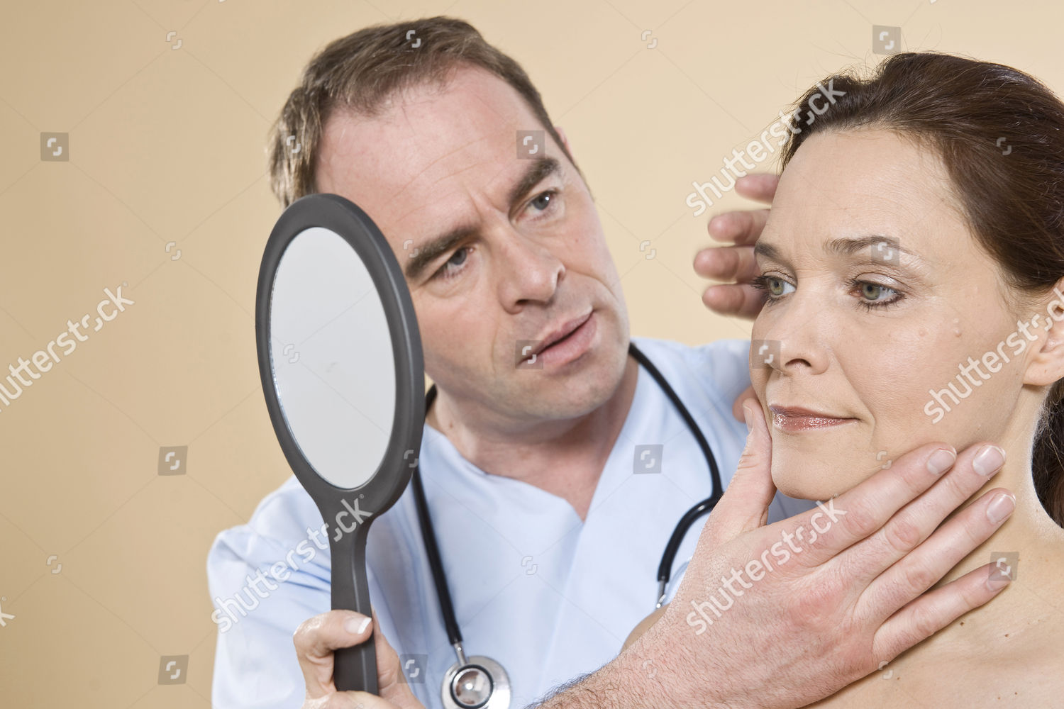 model-released-doctor-explaining-patient-process-editorial-stock-photo