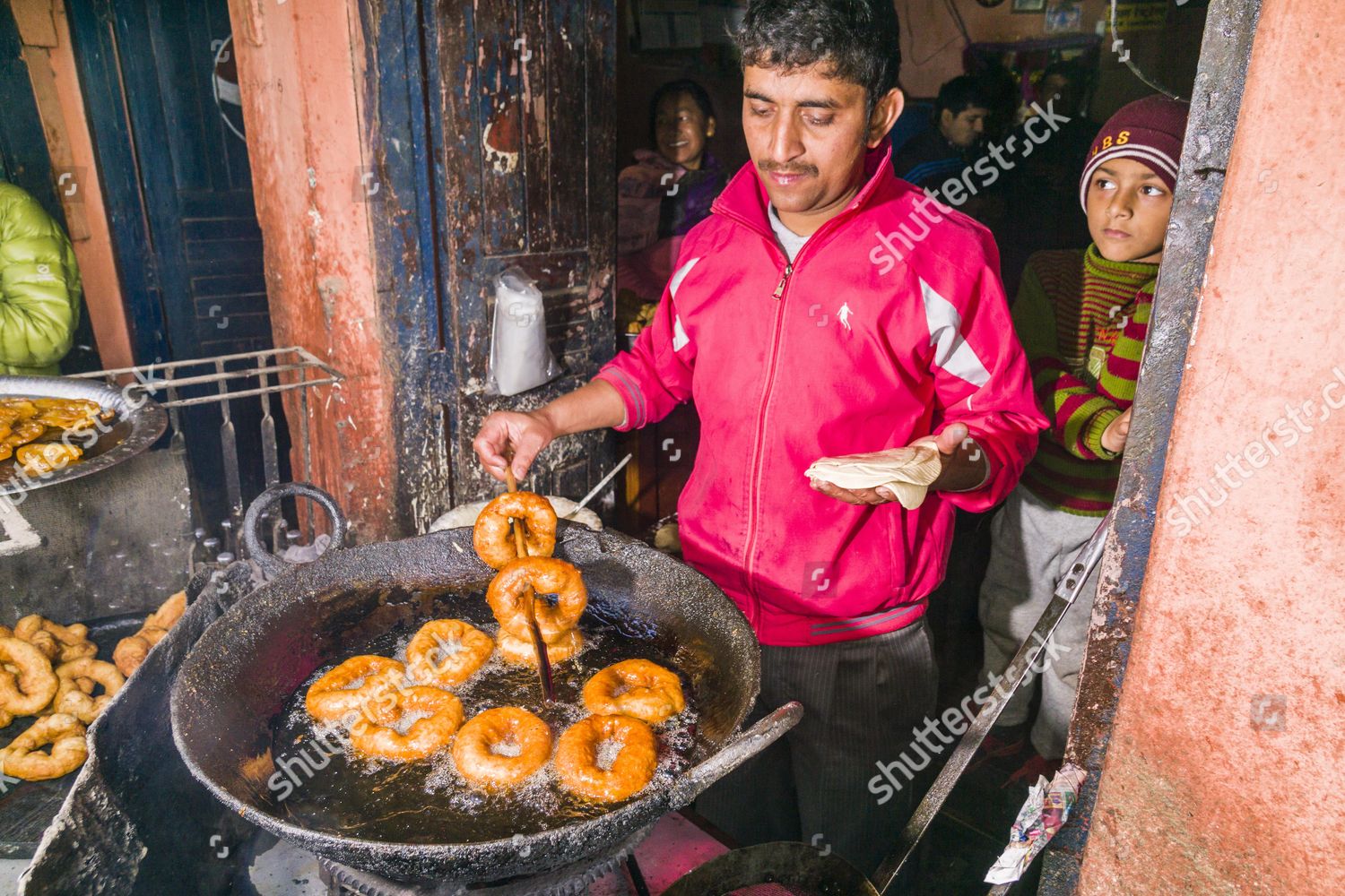 man-frying-doughnuts-big-pan-typical-editorial-stock-photo-stock