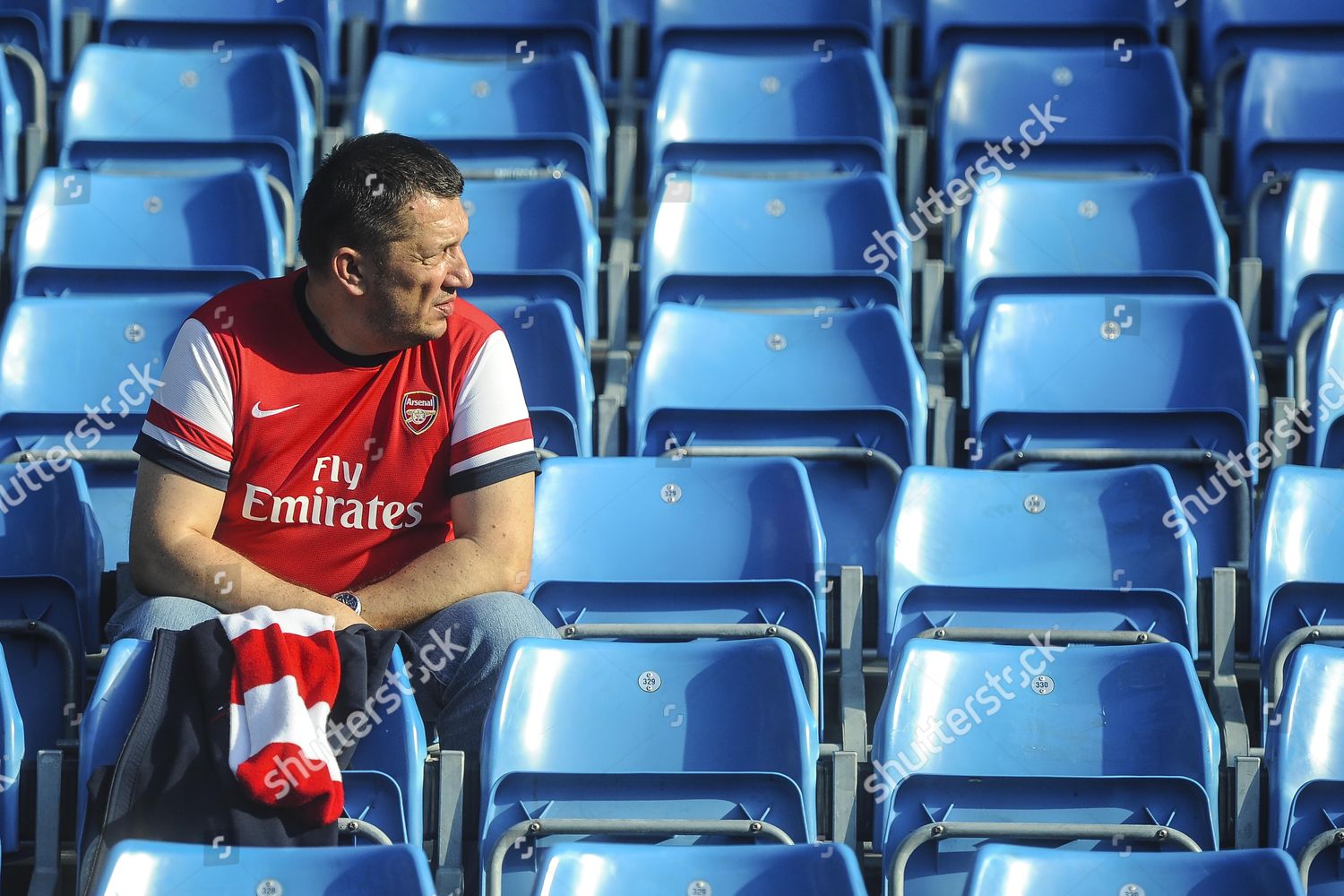 Disgusted Arsenal Fan Watches On His Fellow Editorial Stock