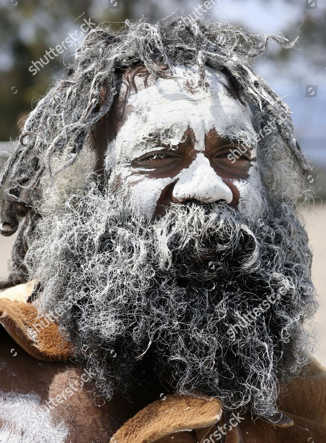 close-up-of-of-an-aboriginal-man-with-white-face-paint-shutterstock-editorial-626018a.jpg