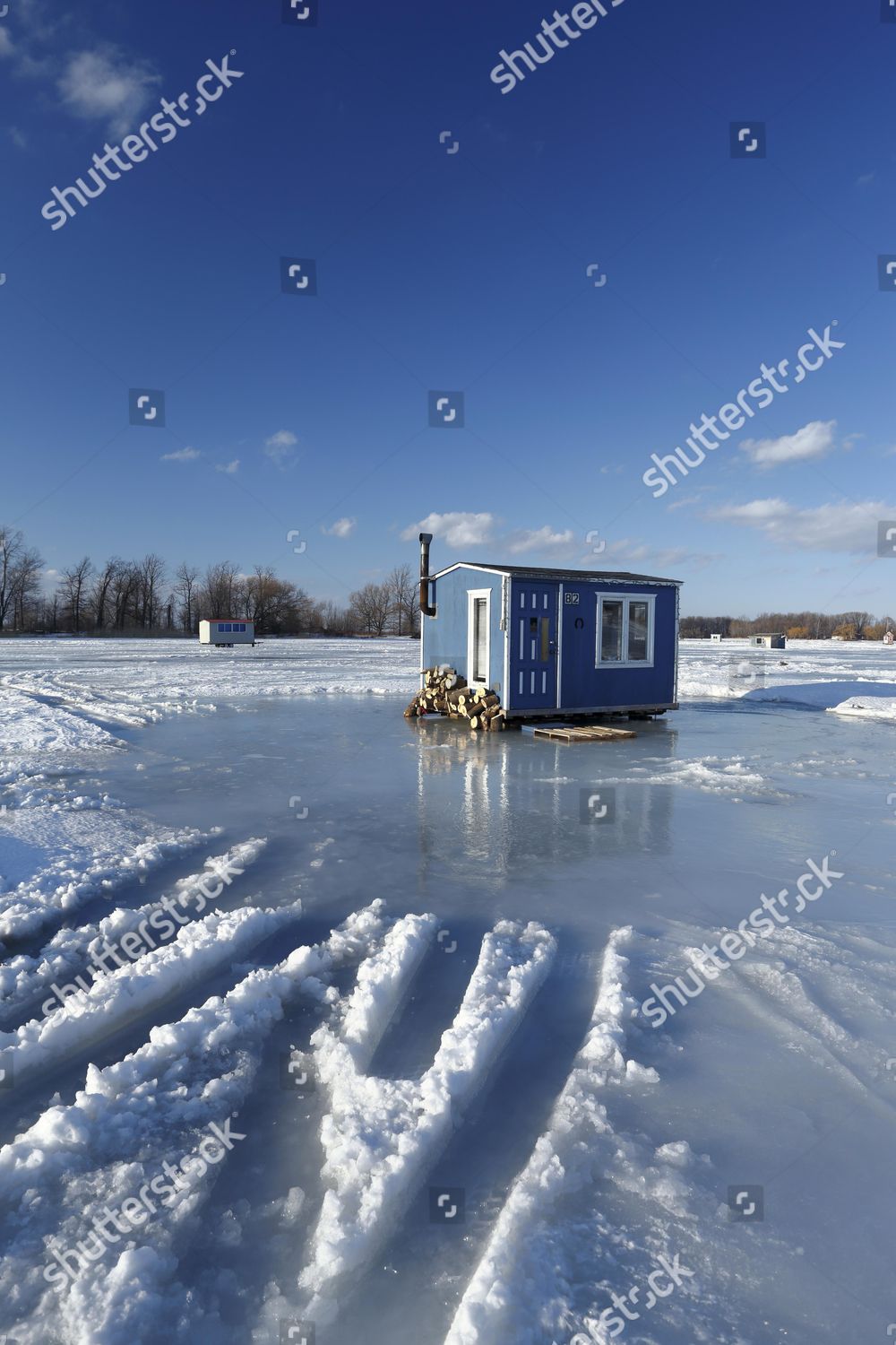 Ice Fishing Cabin On Frozen Saint Lawrence Editorial Stock Photo