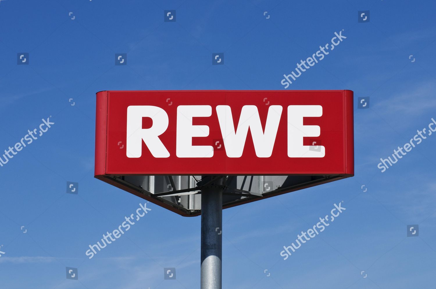 Logo Rewe Supermarket Chain Against Blue Editorial Stock Photo - Stock