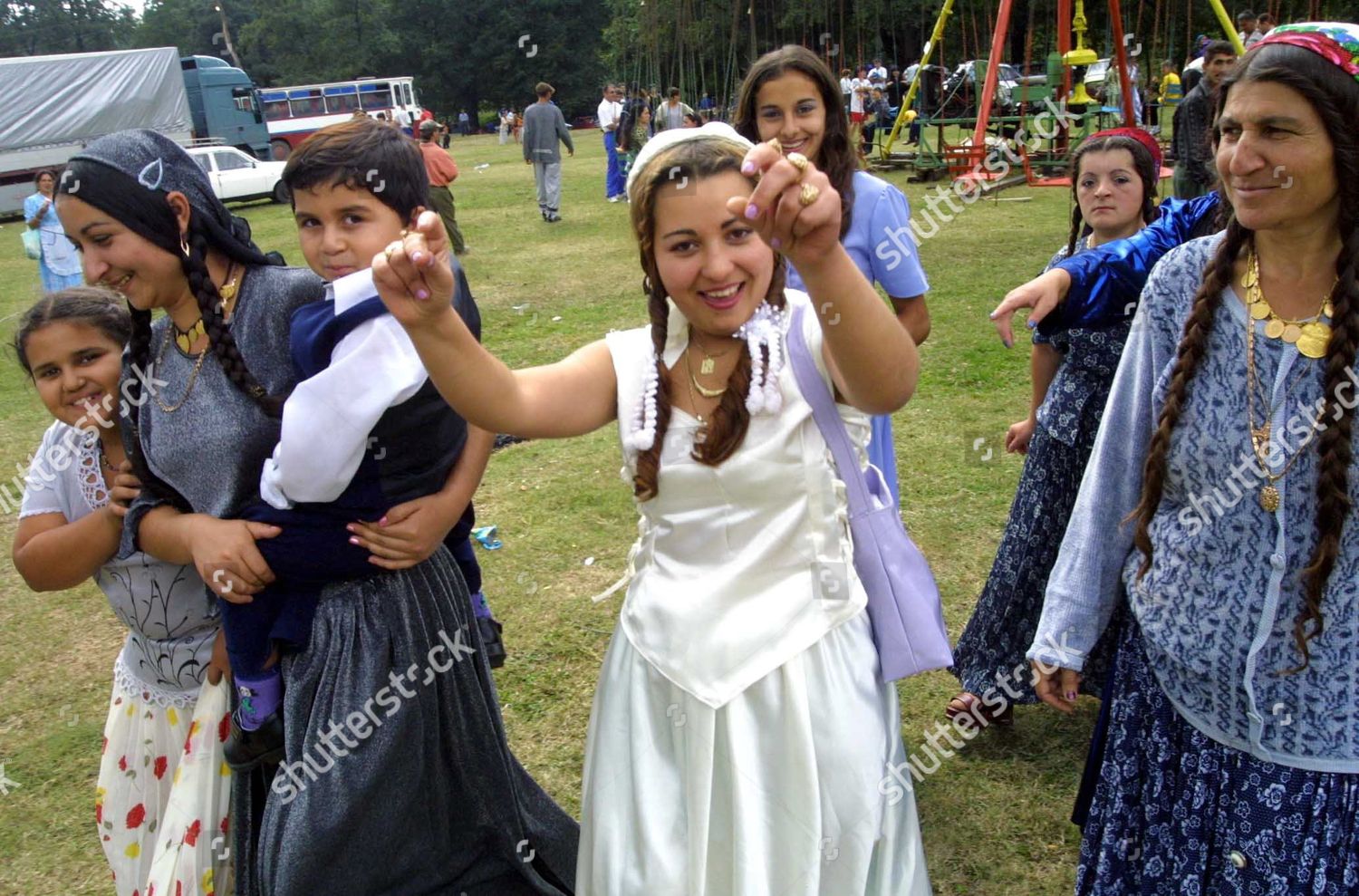 A Romanian Gypsy girl looks on in Costesti, Romania, 250 west of