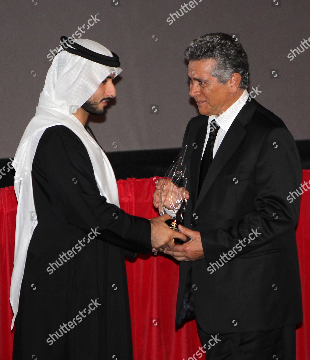 IRANIAN ACTOR BEHROUZ VOSSOUGHI R RECEIVES Editorial Stock Photo 