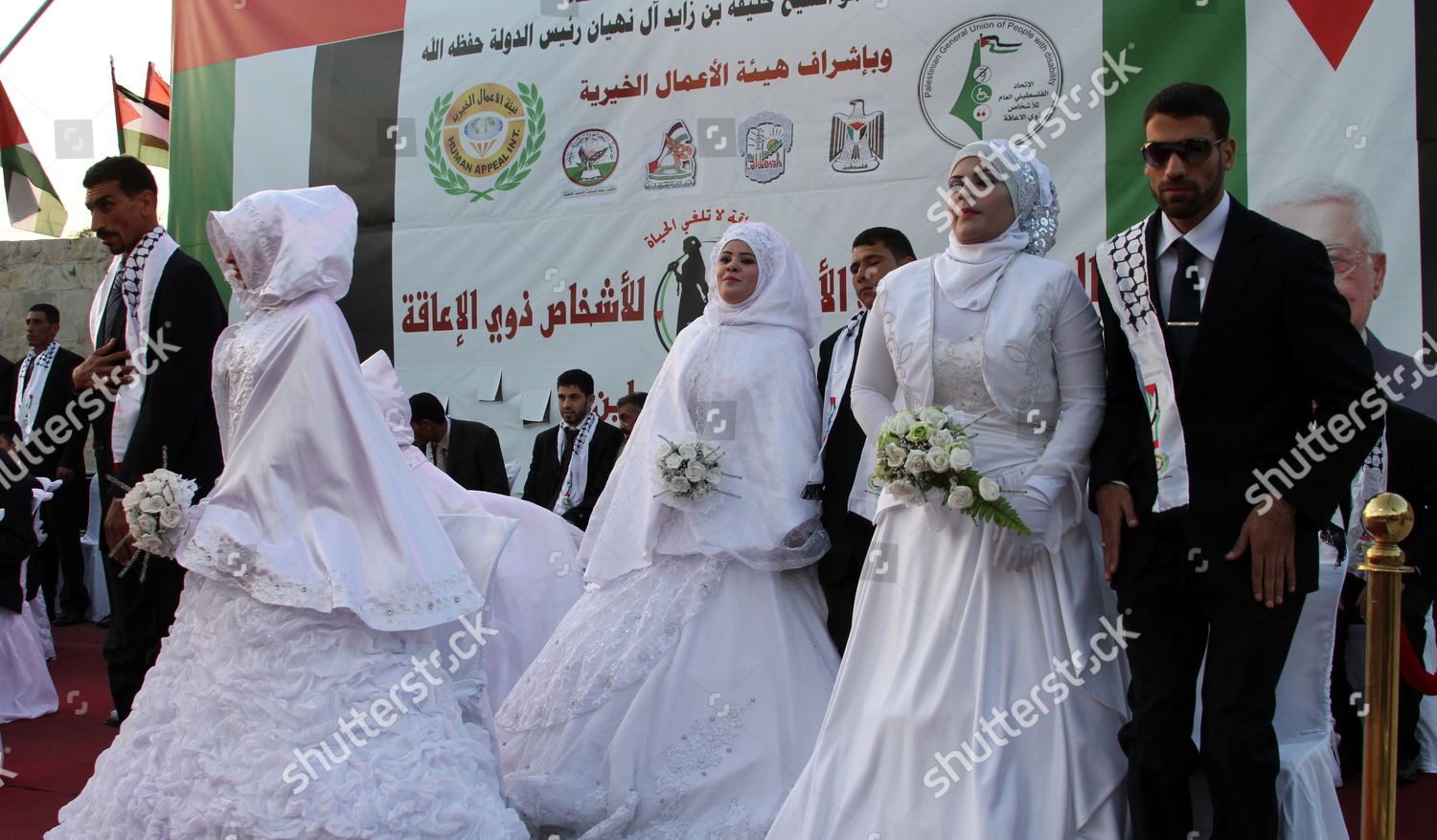 Palestinian Handicapped Couples Pose Photos During Mass Editorial
