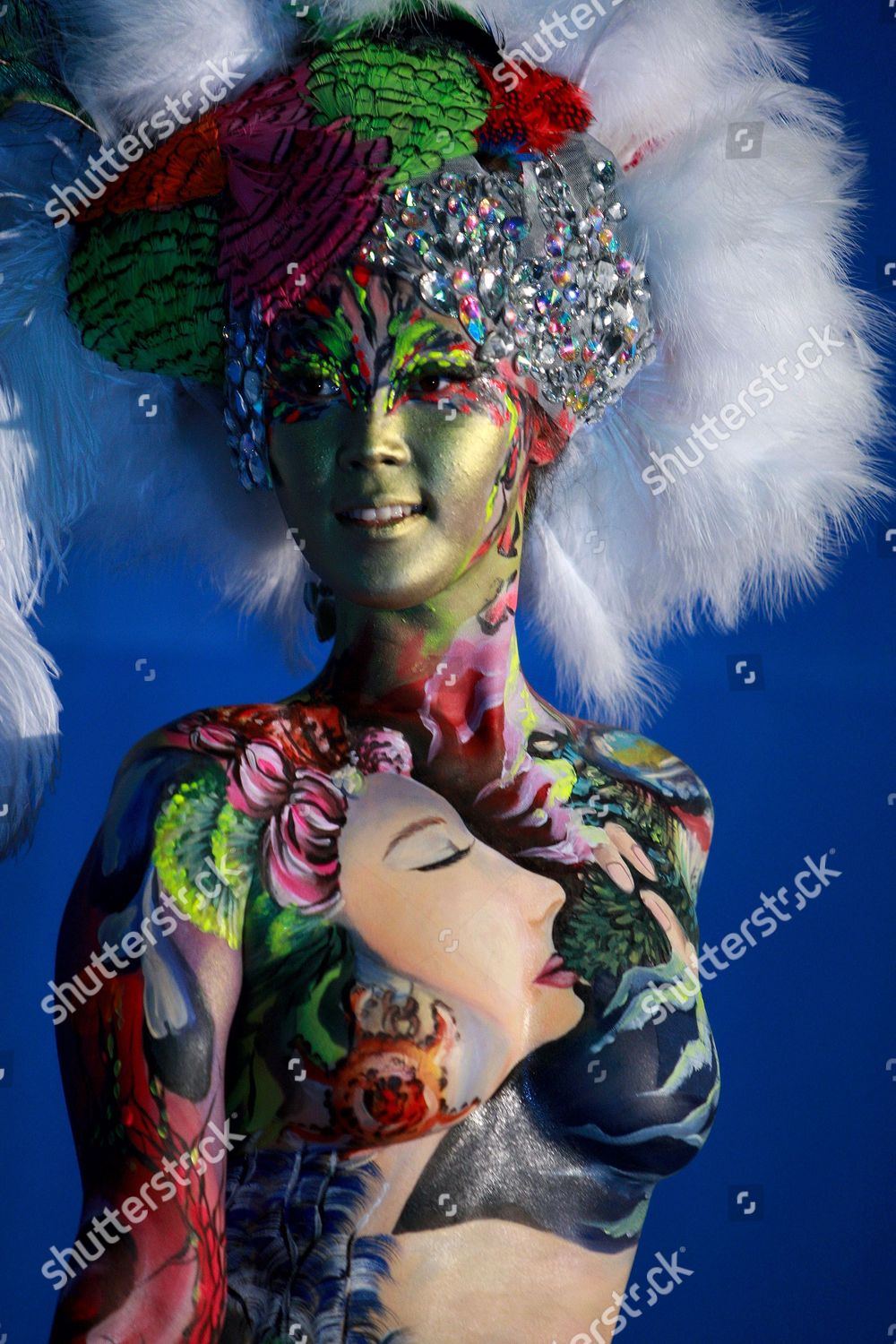 Model Poses During International Body Painting Festival Editorial