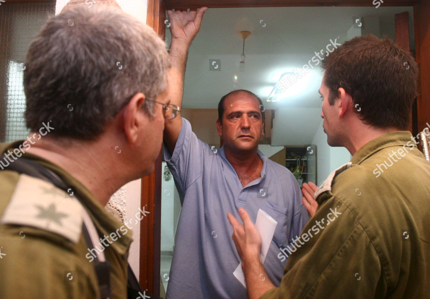 Israeli Settler Listens Soldiers Explain Repercussions Editorial Stock israeli-settler-listens-soldiers-explain-repercussions-editorial-stock