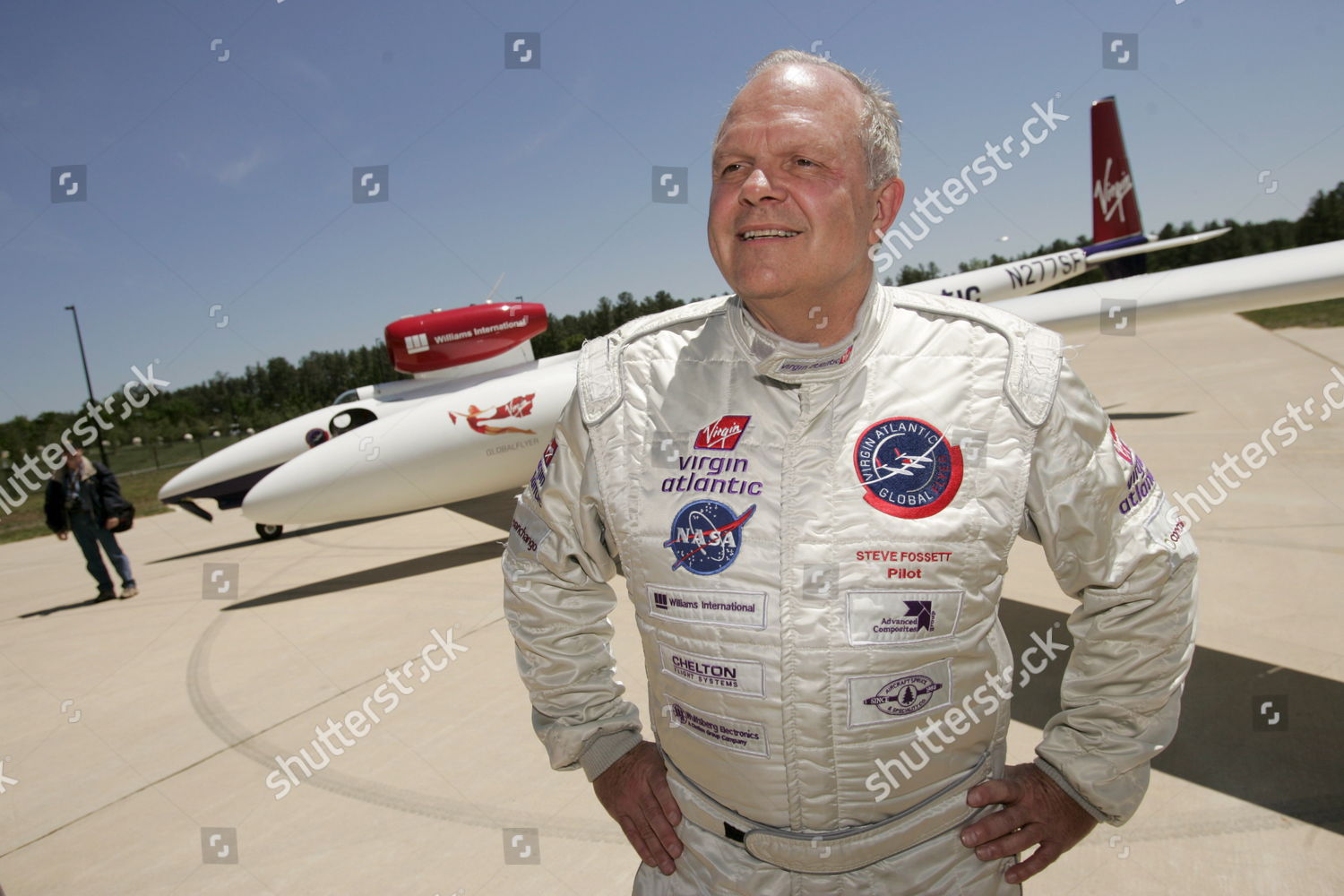 Steve Fossett standing confidently, embodying the spirit of adventure