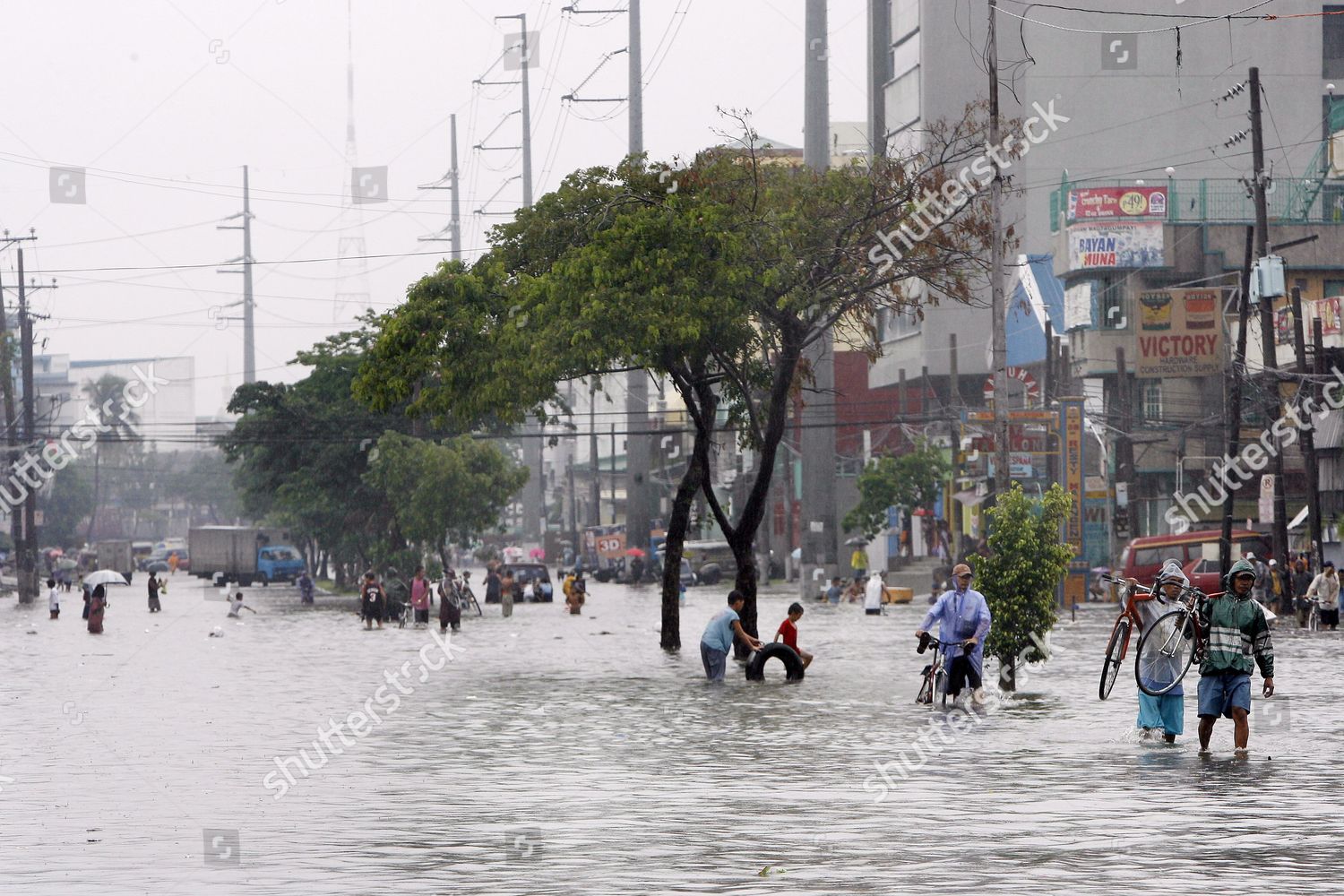 Filipinos Tread Flooded Roads Metro Manilas Editorial Stock Photo ...