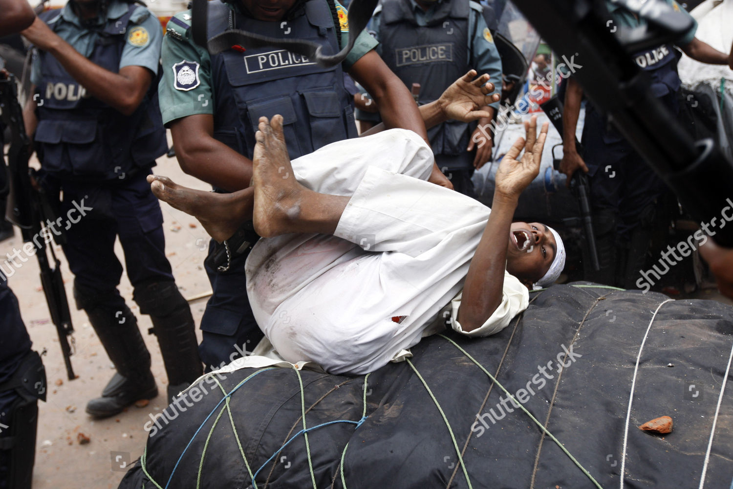 Police Beat Supporter Hefajate Islam Following Clashes Editorial Stock  Photo - Stock Image | Shutterstock