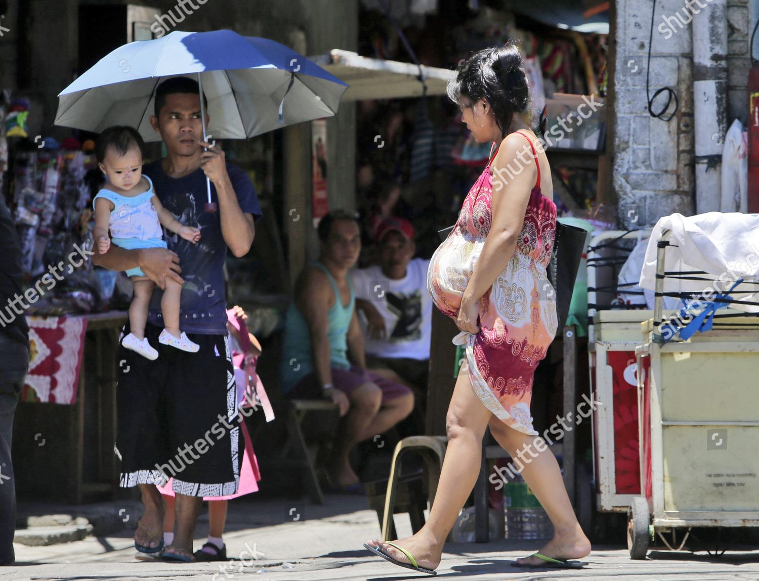 pregnant-filipino-woman-walks-street-manila-editorial-stock-photo