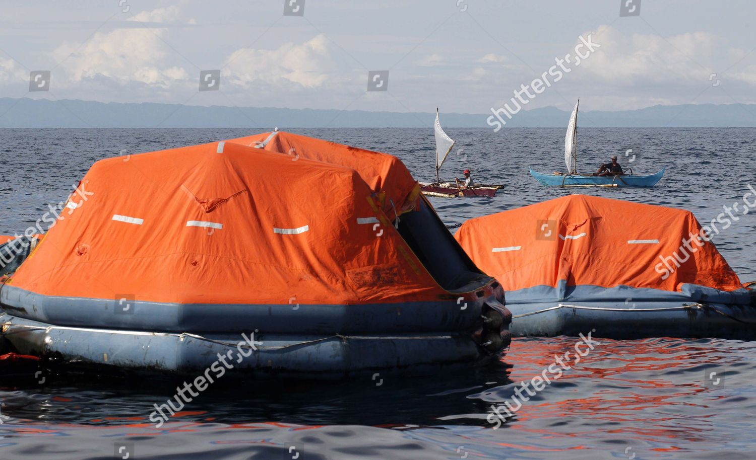 Filipino Fishermen Front Floating Life Rafts Editorial Stock Photo