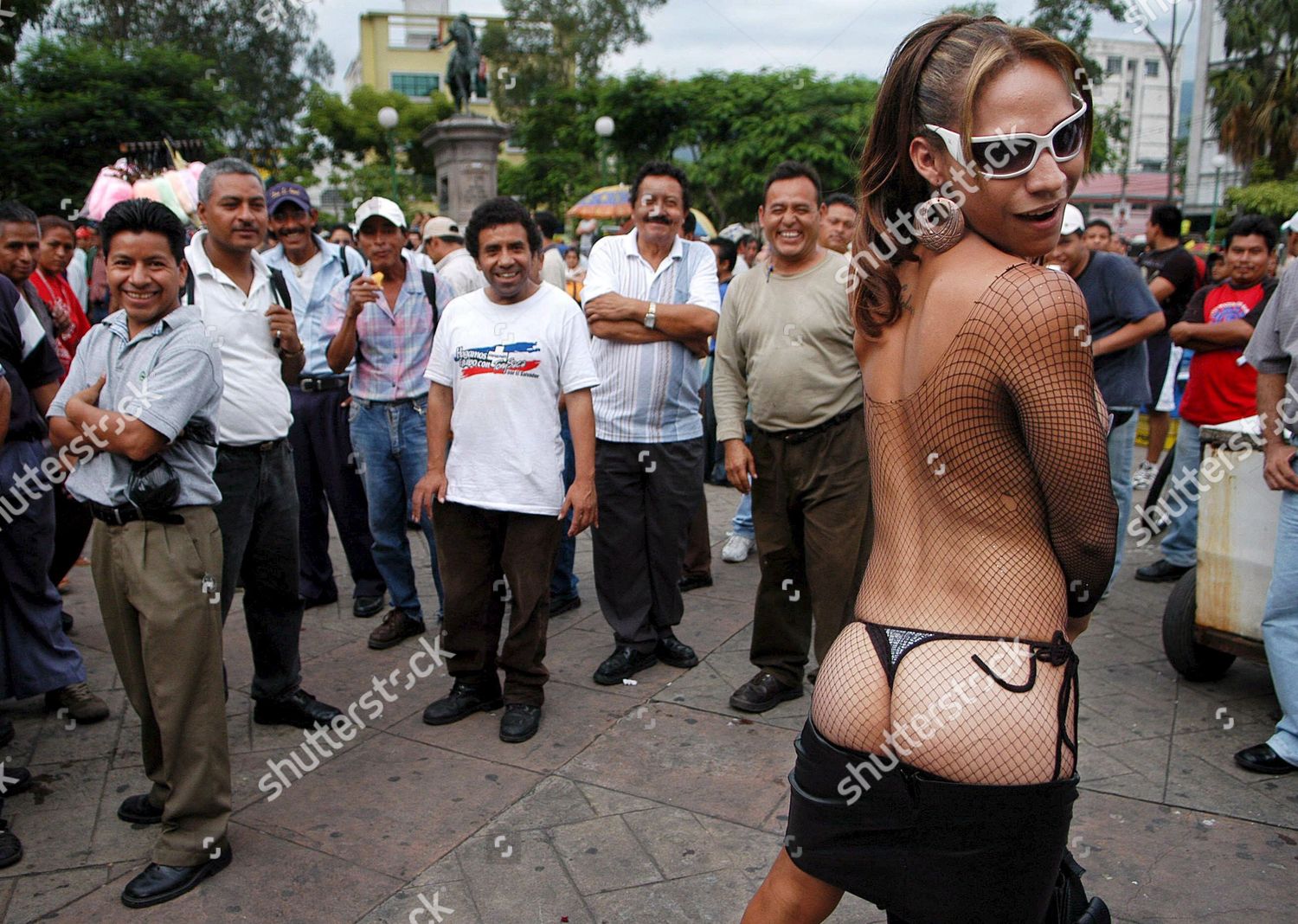 Salvadorean Crossdresser Poses Onlookers During Gay Pride