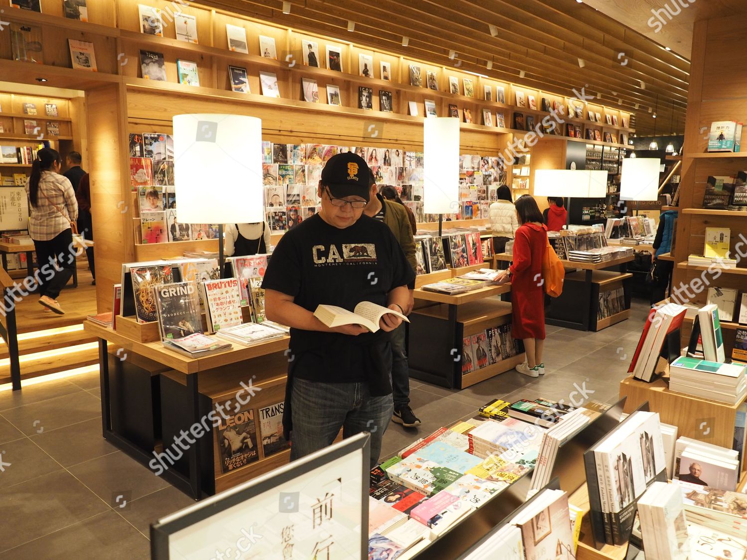 Customers read books magazines Tsutaya Bookstore branch Editorial Stock