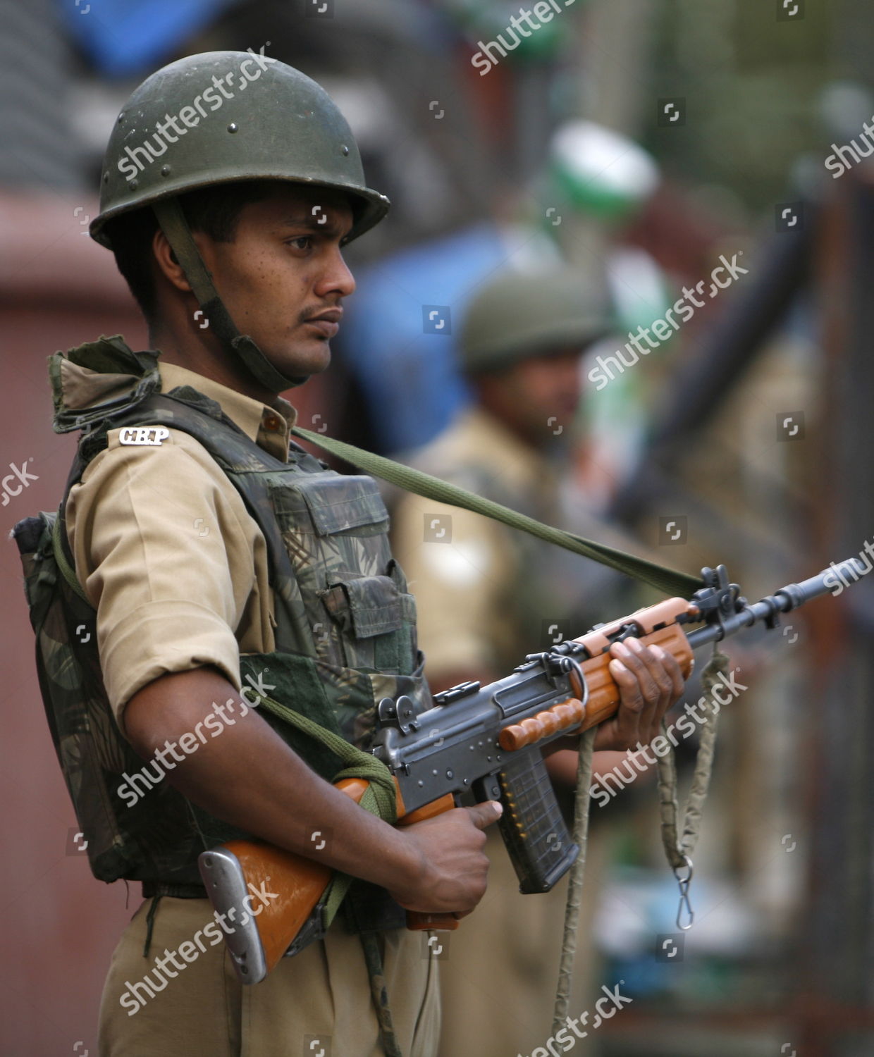 Indian Paramiltary Soldiers Stand Guard Indian Home Stock Photo