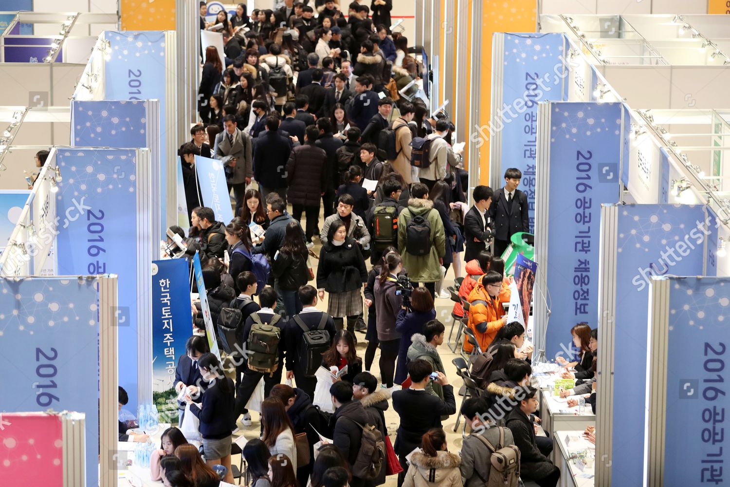 Jobseekers Look Around Booths During Job Fair Editorial Stock Photo