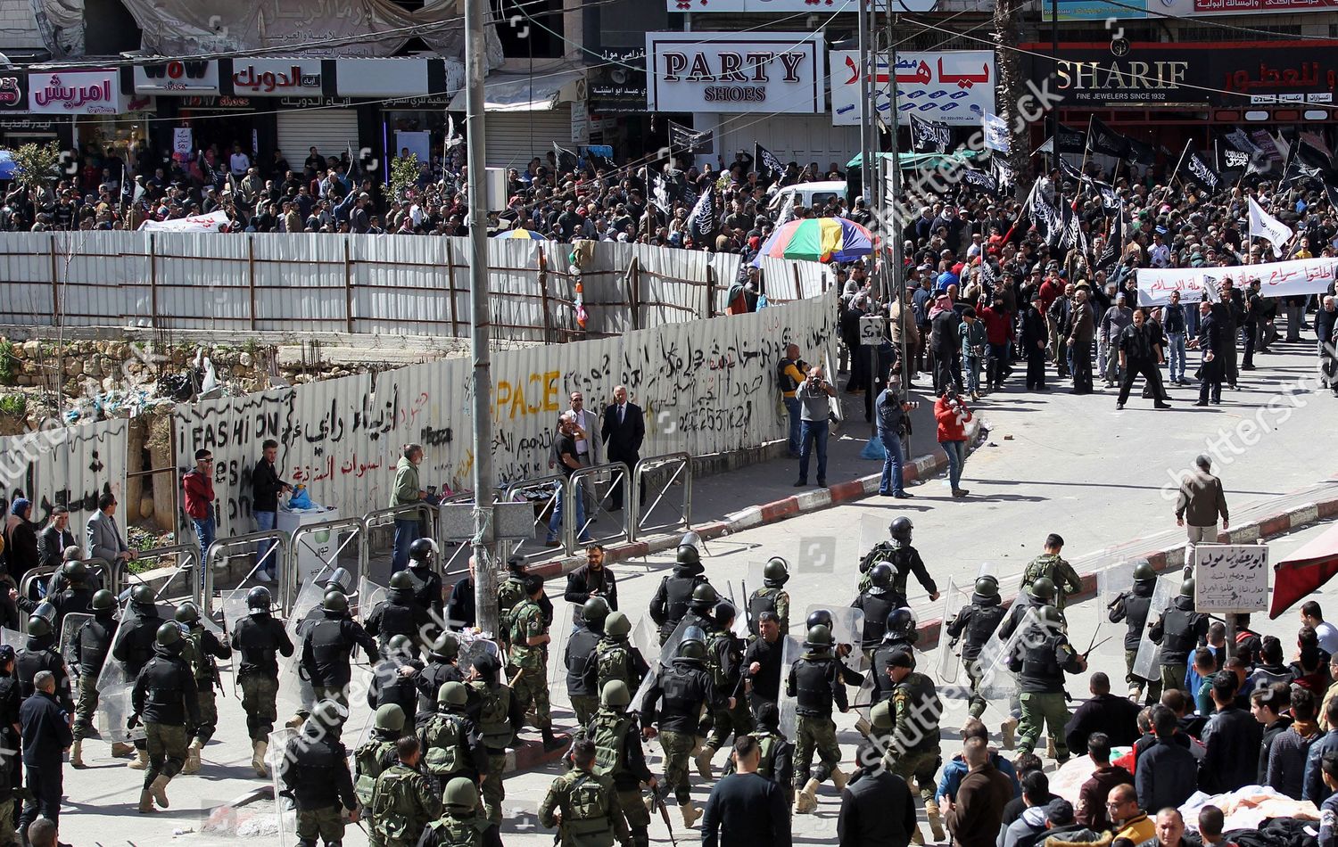 Members Palestinian Security Forces Clash Demonstrators During   Hizb Ut Tahrir Protest Over Political Arrests Hebron West Bank Shutterstock Editorial 8444601k 