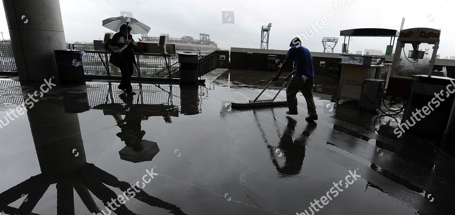 Worker Squeegees Puddle Inside Arthur Ashe Editorial Stock Photo