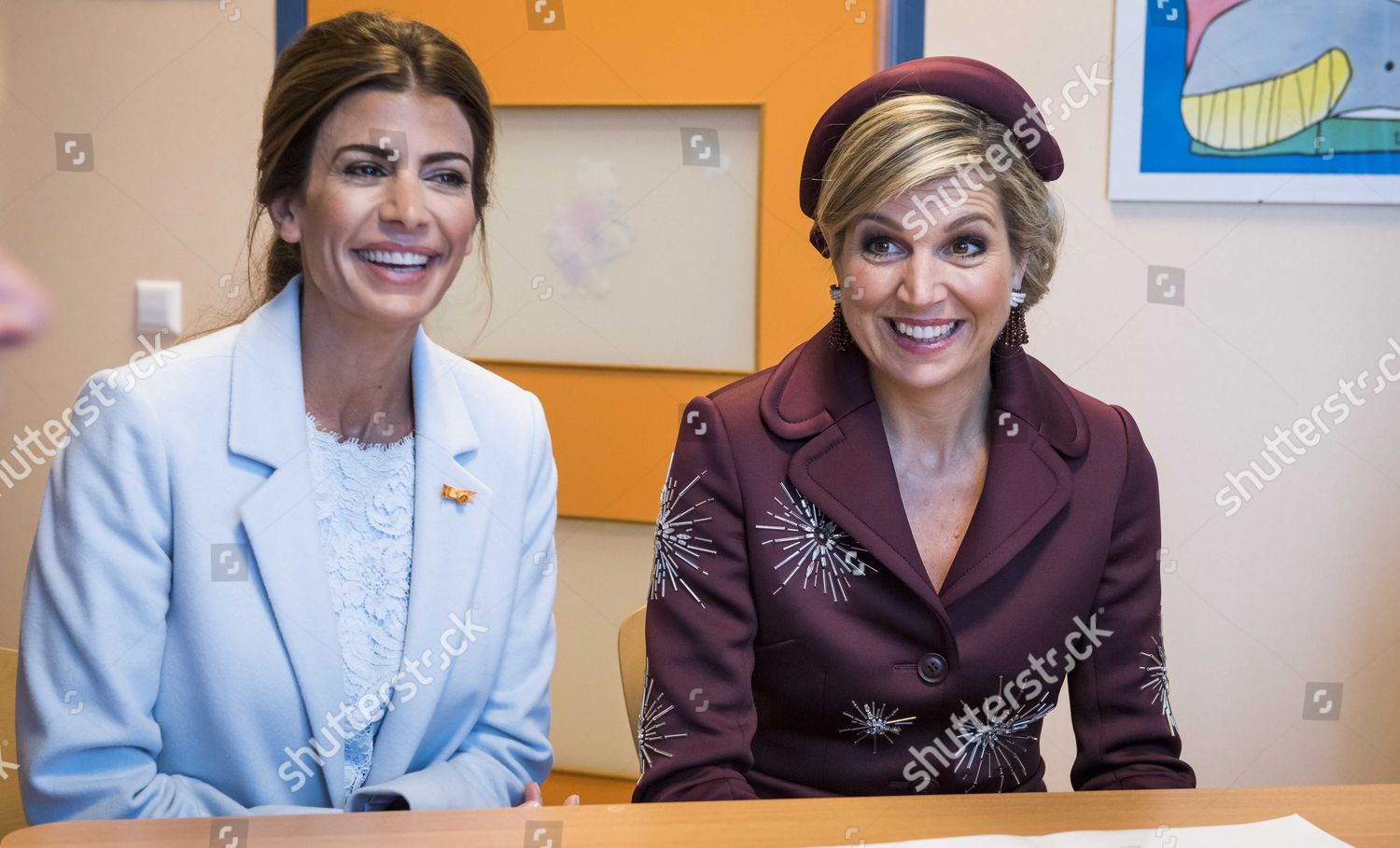 queen-maxima-and-argentine-first-lady-juliana-visit-cjg-the-hague-netherlands-shutterstock-editorial-8556218c.jpg