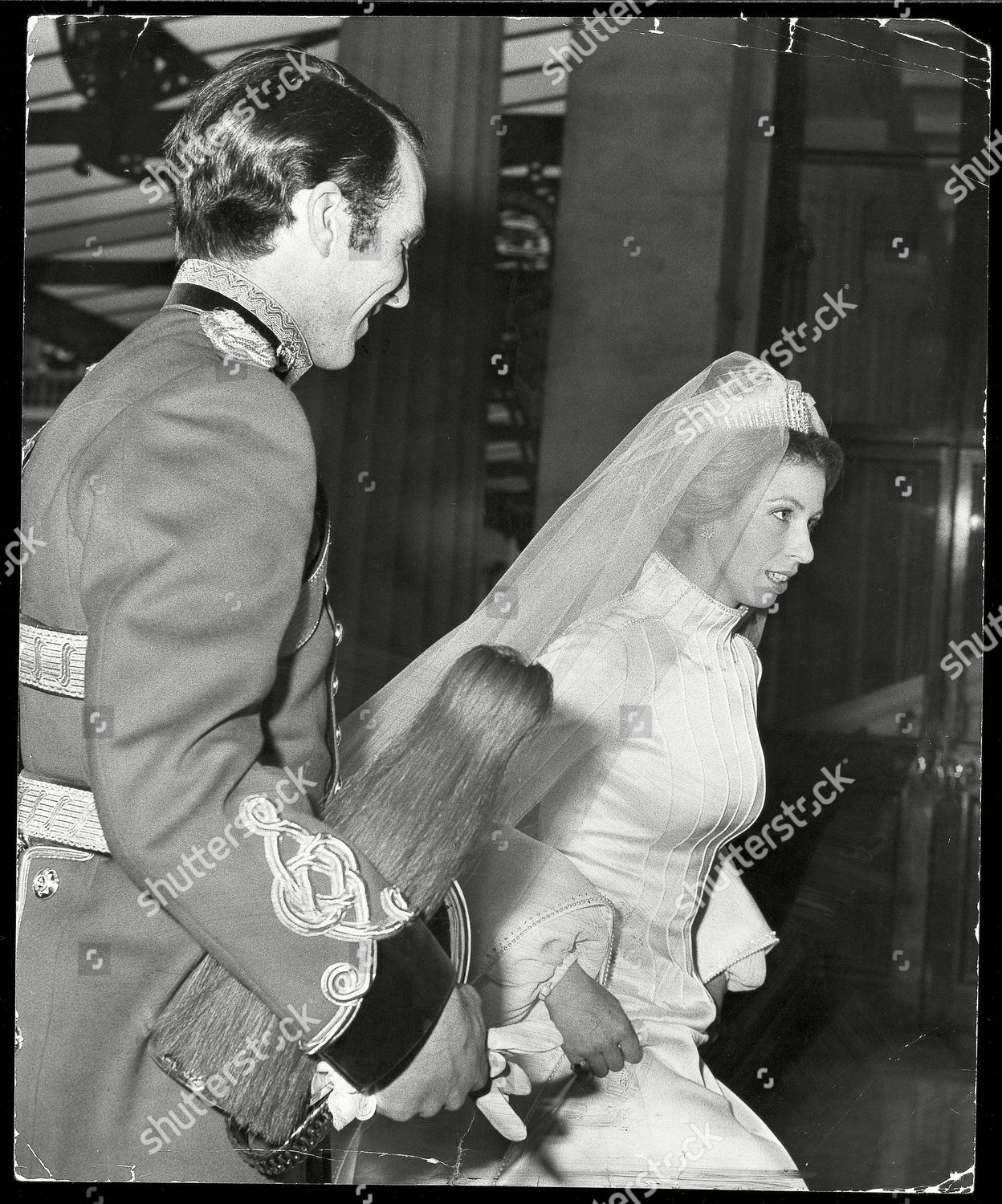 princess-anne-marries-her-royal-highness-princess-anne-now-princess-royal-with-mark-phillips-at-buckingham-palace-on-the-return-from-their-wedding-on-november-14-1973-shutterstock-editorial-889205a.jpg