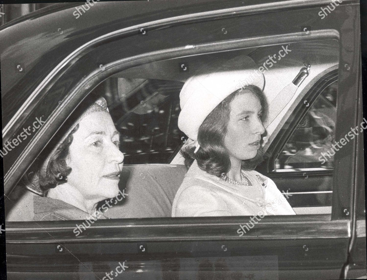 princess-anne-now-princess-royal-april-1966-princess-anne-is-pictured-returing-to-buckingham-palace-by-car-with-royal-governess-miss-catherine-peebles-after-watching-the-queen-ceremoniously-open-parliament-royalty-shutterstock-editorial-890787a.jpg