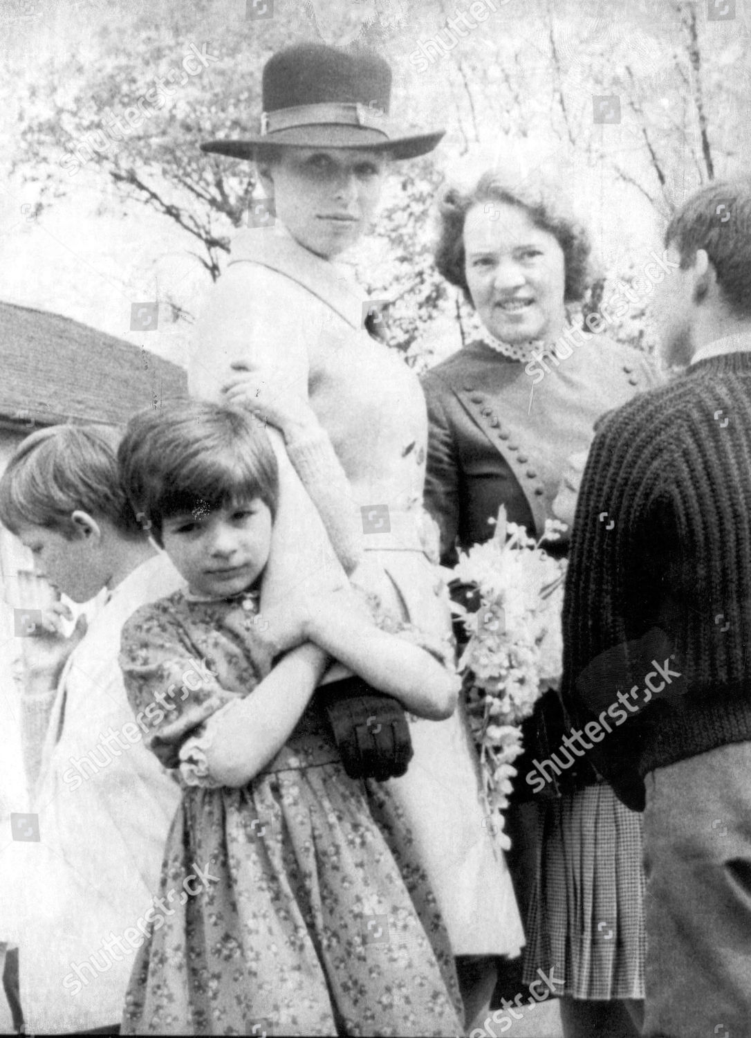 princess-anne-now-princess-royal-1969-picture-shows-princess-anne-visiting-a-home-run-by-the-royal-scottish-society-for-the-prevention-of-cruelty-to-children-in-polwarth-edinburgh-eight-year-old-carole-who-had-presented-a-posy-of-flowers-when-th-shutterstock-editorial-890813a.jpg
