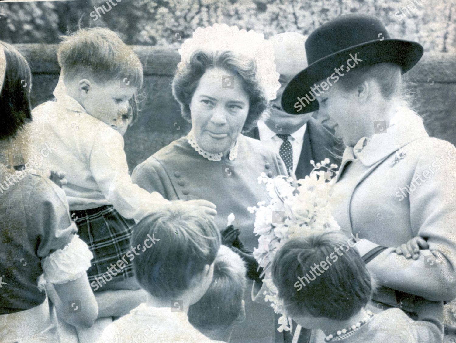 princess-anne-now-princess-royal-1969-picture-shows-princess-anne-wearing-a-large-cowboy-style-hat-during-her-visit-to-a-chidlrens-home-in-polwarth-terrace-edinburgh-the-princess-toured-the-house-and-gardens-and-children-clung-on-to-her-all-th-shutterstock-editorial-890815a.jpg